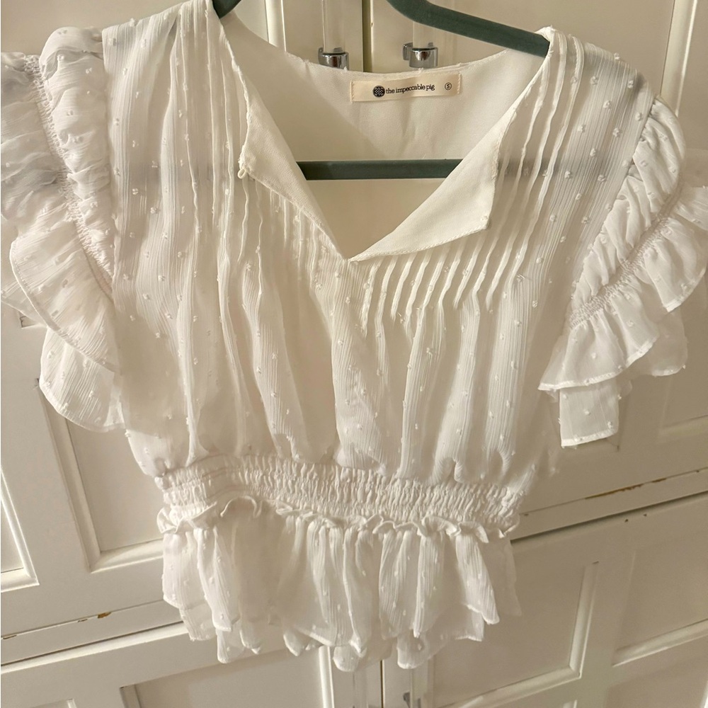 White ruffled top from the Impeccable Pig, size S